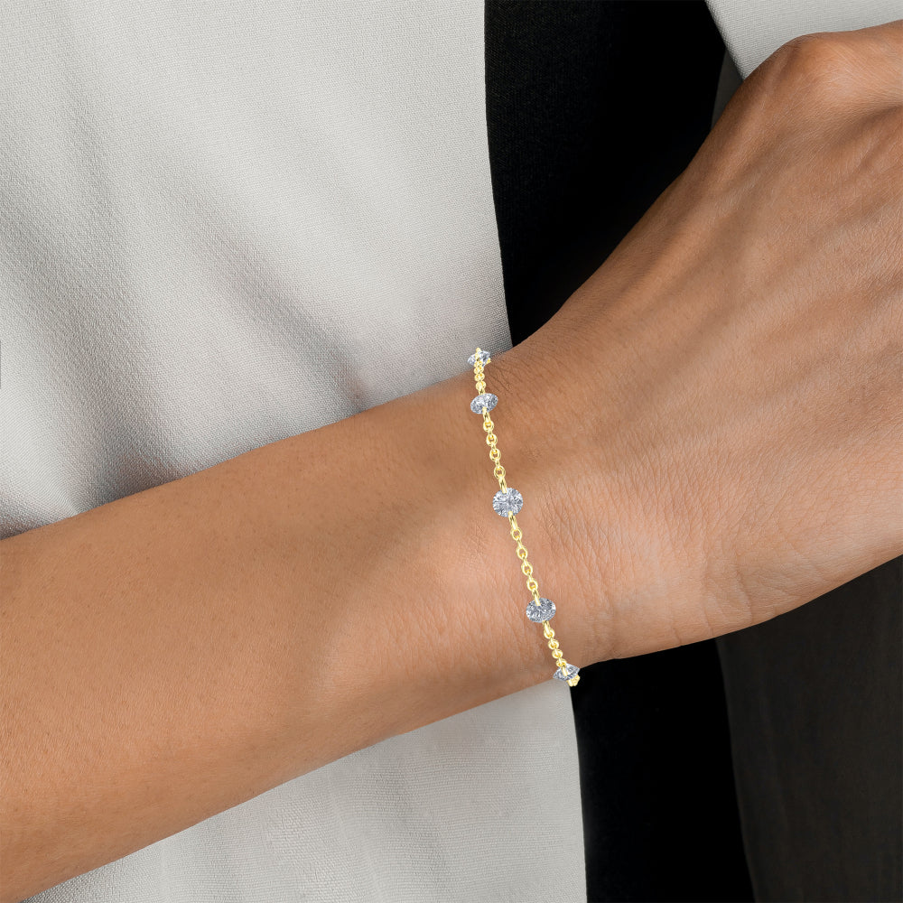 Lab Grown Diamond Round Floating Diamond Station Bracelet in Yellow Gold – Side View | JAUR